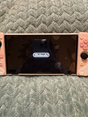 Nintendo Switch with Pink Joy-Con Covers With Accessories and Games